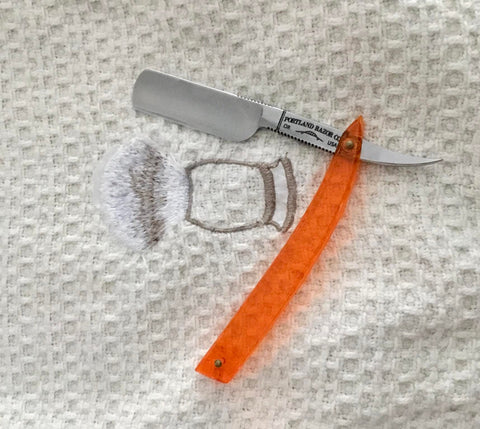 Portland Straight razor with an acrylic orange handle