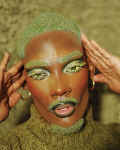 alien man, green alien makeup, green mustache, glossy lips