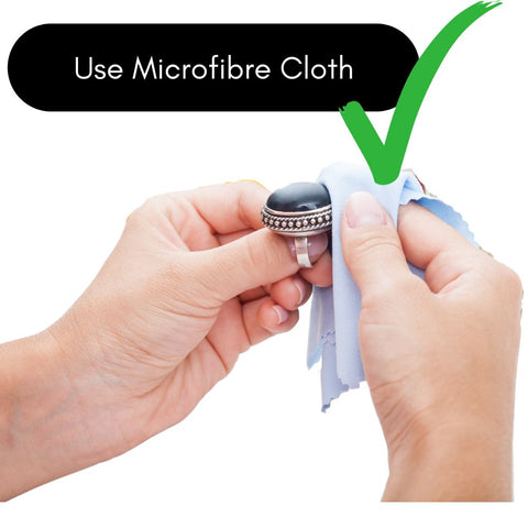 picture of recommended cleaning for photo projection jewellery using microfiber cloth