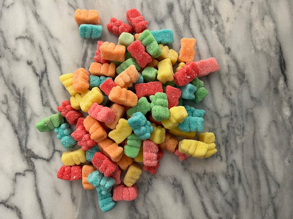 Sour Gummy Bears on Marble Counter Top