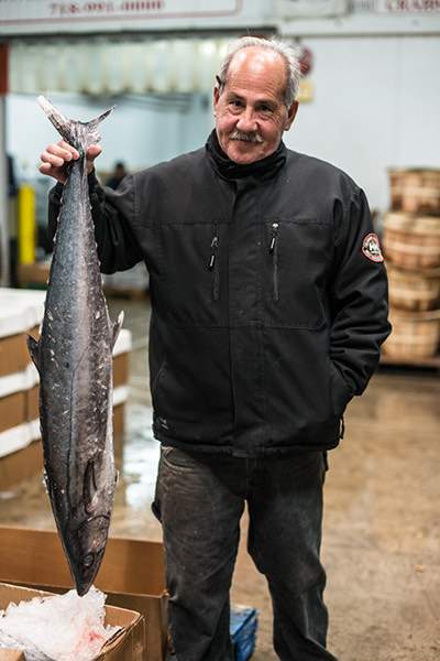 Fishmonger with Whole Fish