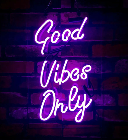 the image tells us that the good vibes only neon sign actually reflects positive atmosphere in your living area