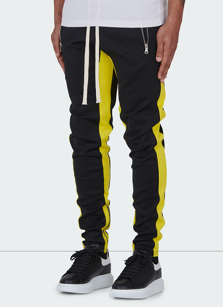 track pants black and yellow