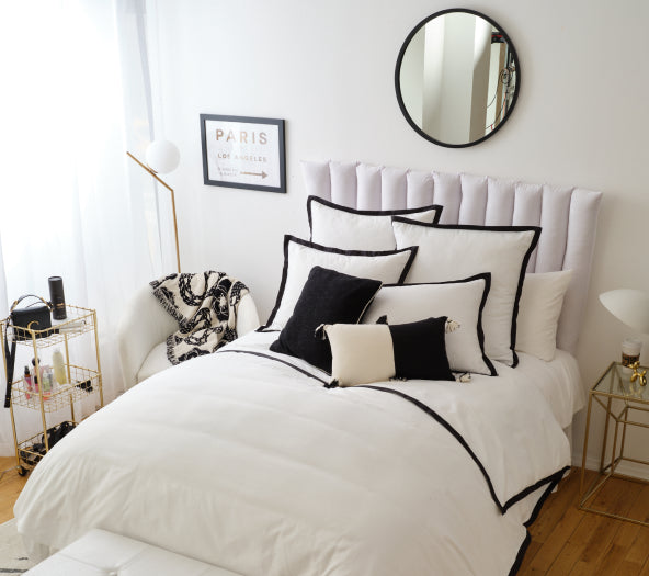Black and white minimalist hotel inspired dorm room from Dormify