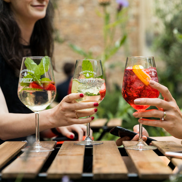 Three Fentimans cocktails being drunk in Secret Spritz Garden