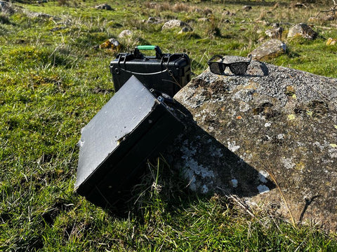A suitcase in a field