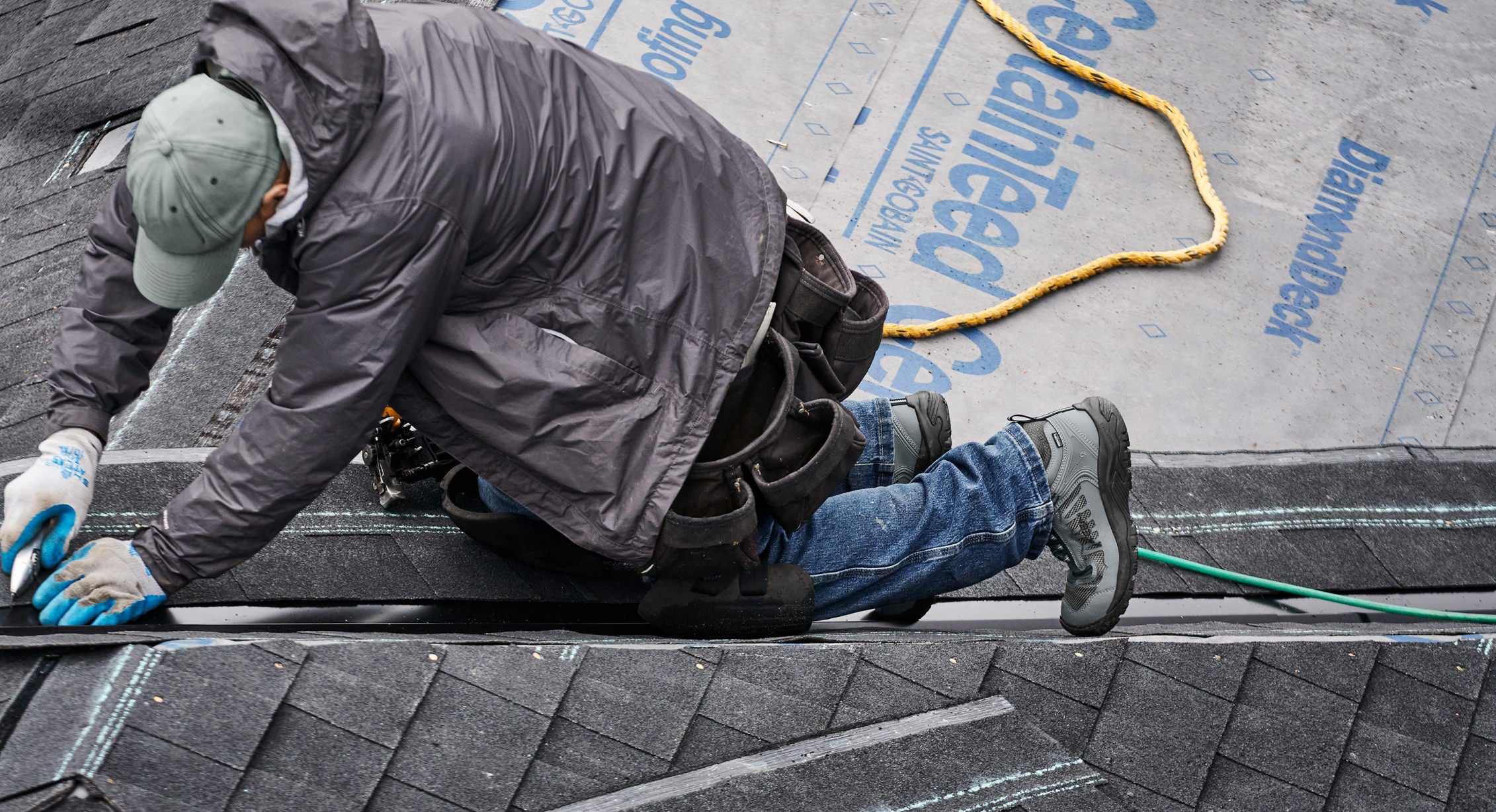 Roofer installing a new roof in the Reno shoe