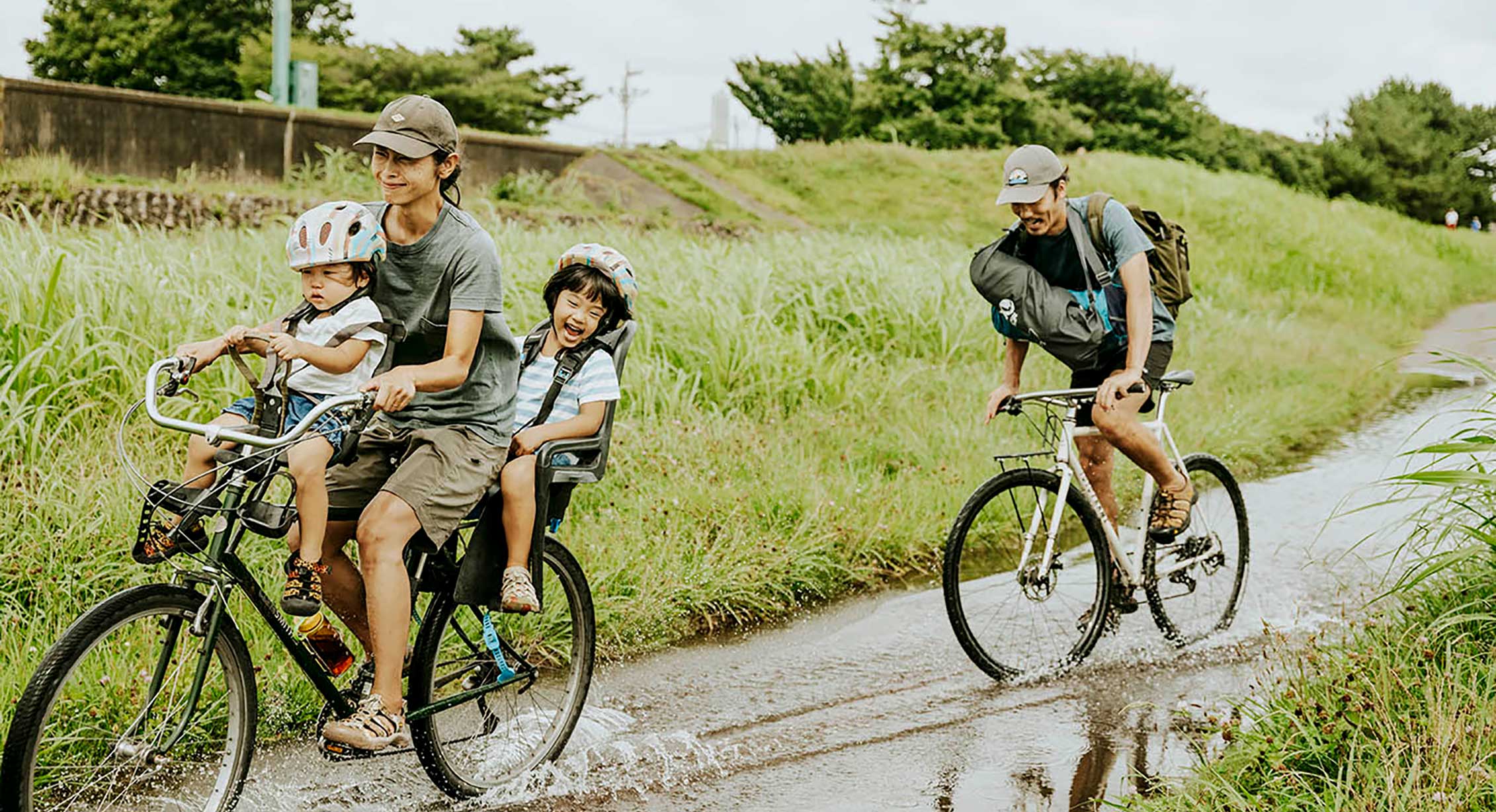 A Japanese family riding bicycles