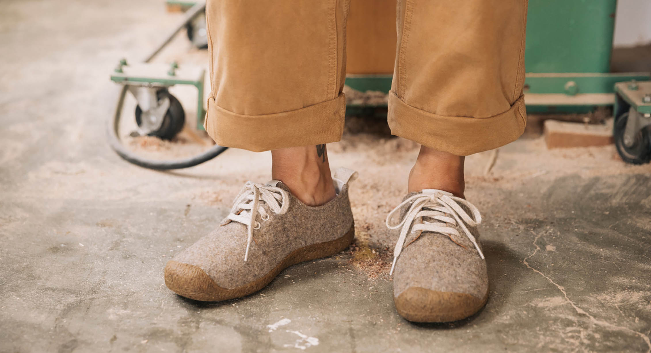 A person wearing Mosey derby shoes at work