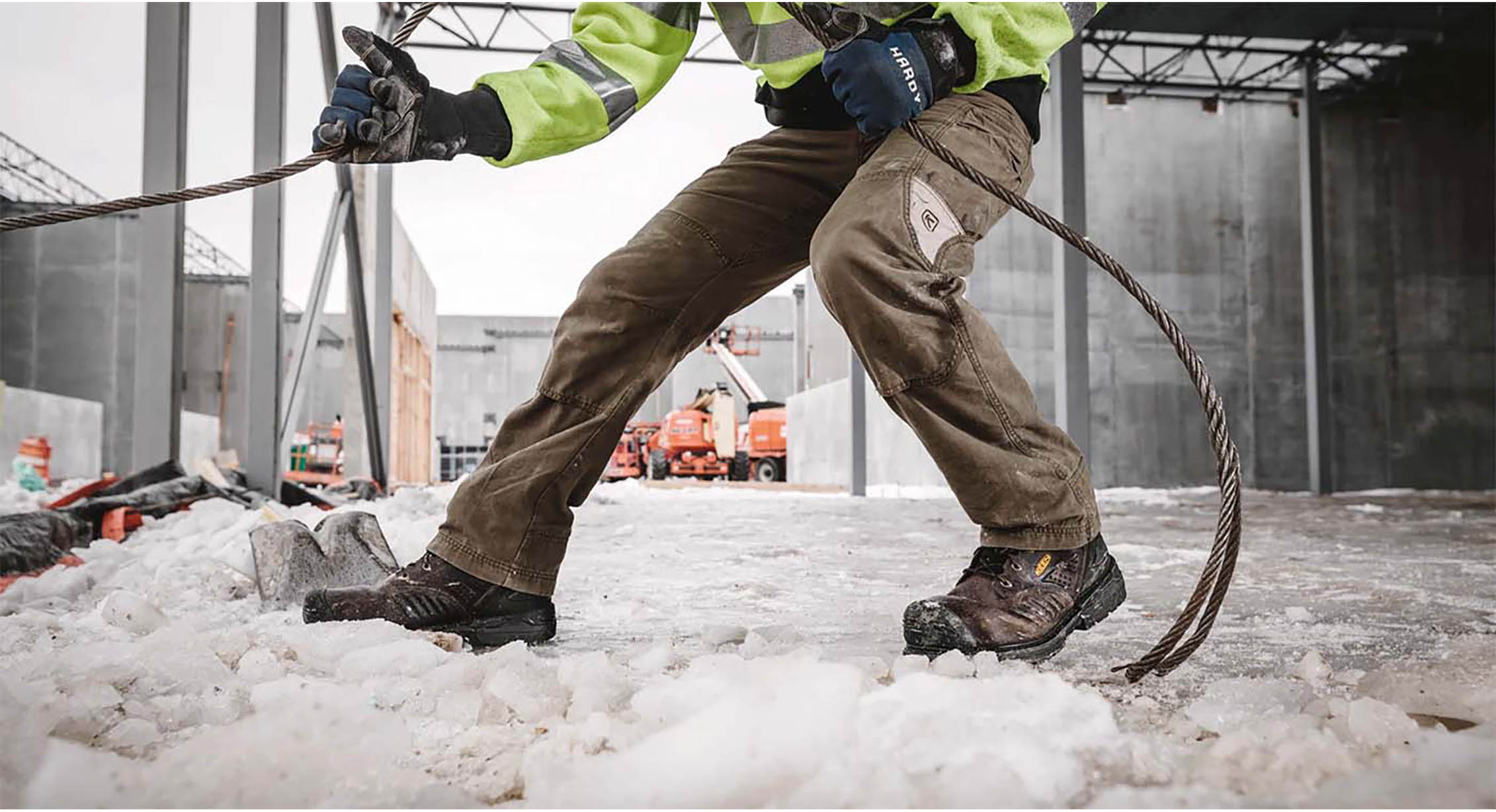 A man working on an icy construction site