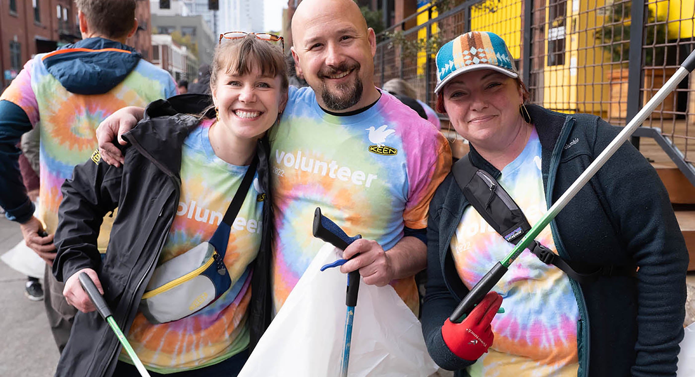 KEEN employees picking up trash together on Earth Day