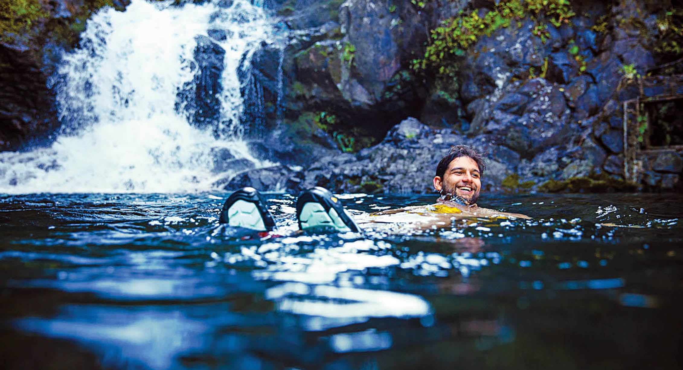 Swimming in Hawaiian waterfalls in KEEN water sandals