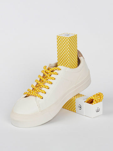 Cordones con estampado polka dots blancos sobre amarillo