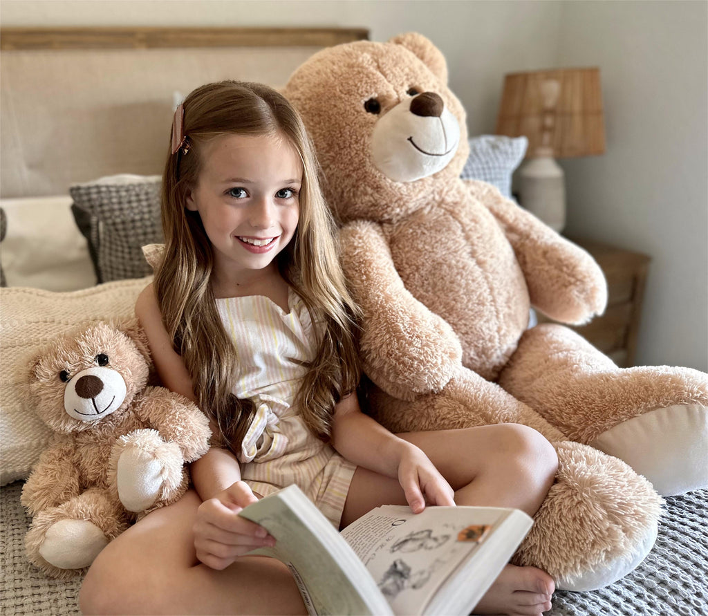 This lovely 39-inch teddy bear comes with an adorable baby teddy, so charming! You'll find a rainbow of different colors to pick from. Each and every one of our teddy bears is made with environmentally-friendly, oh-so-snuggly plush fabric and filled with PP cotton for that perfect huggable feeling. They're not just the ideal gift for teddy bear enthusiasts, but also make the cutest decoration for any teddy-bear-themed baby shower or party.