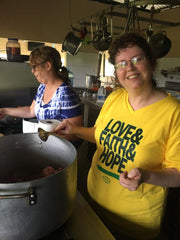 Danielle helping in the kitchen at  a children's home and school