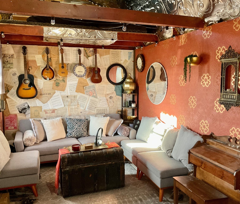 Looking into the tiny home with tin ceilings.