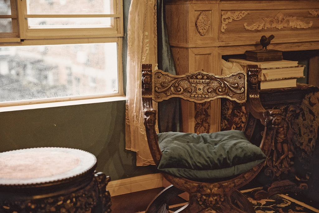 Close up of distressed chair in a rustic room design.