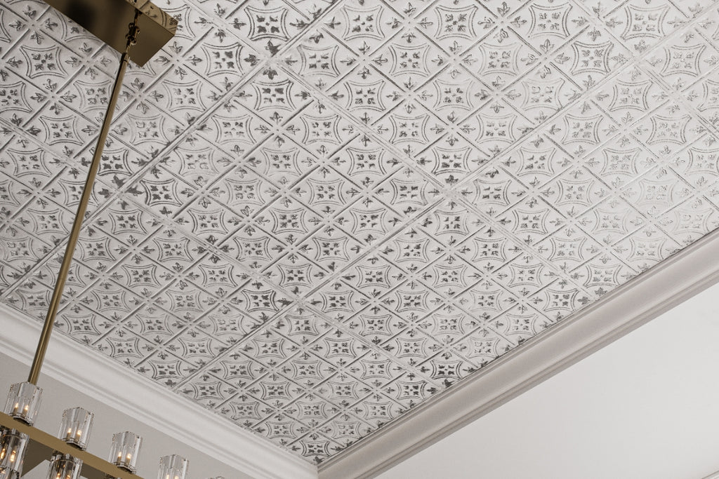 White tin tile in a small self-contained pattern on a tray ceiling.