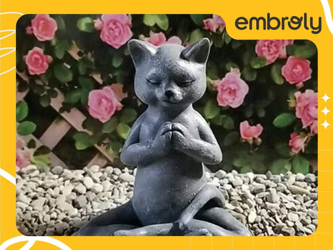 A yoga cat sculpture
