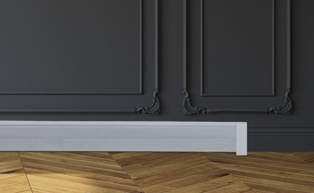 Baseboard heating with a white Baseboarders cover contrasting with a light wooden floor and a dark gray wall.