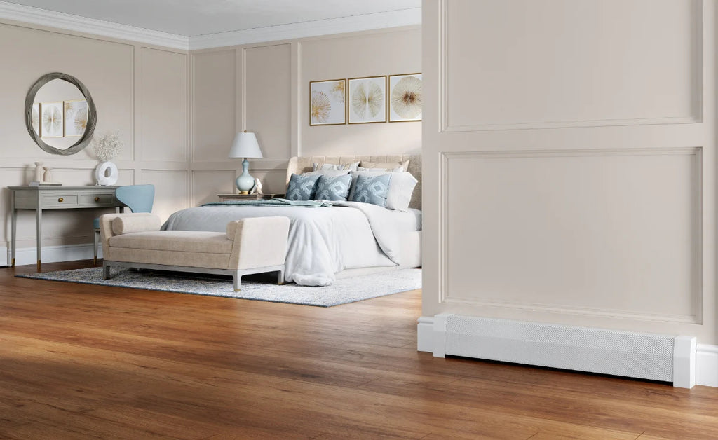 Spacious bedroom with wood floors and white baseboard heaters.