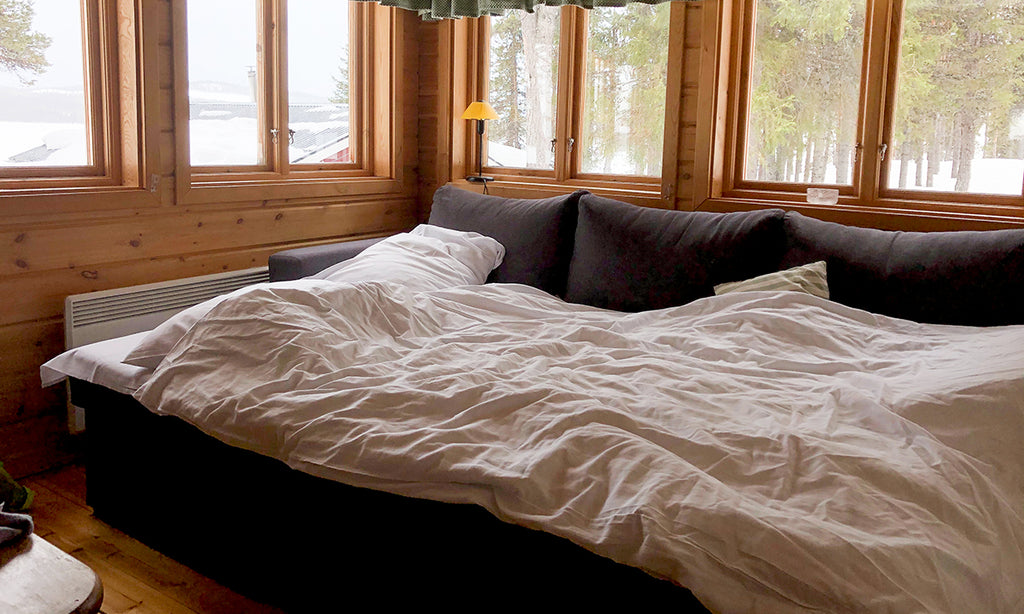 Living room with large convertible sofa into a bed.