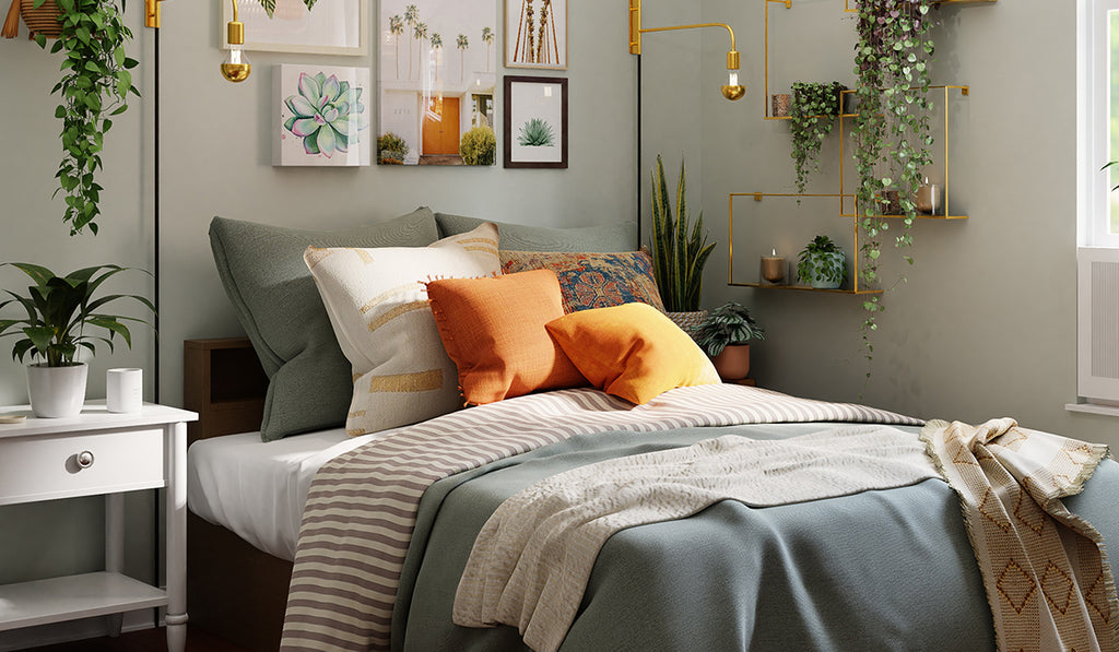 Bedroom with mustard and sage colors and many pillows arranged on the bed.