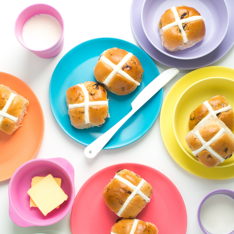 Bamboo colorful plates with hot cross buns