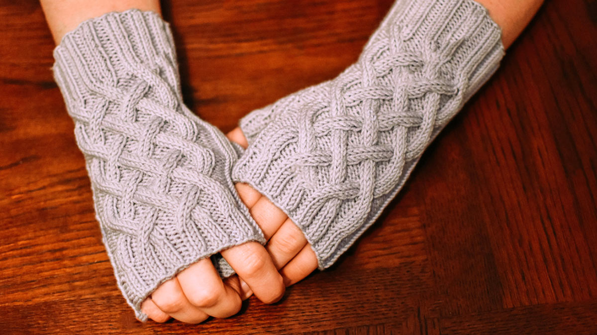 Grey fingerless gloves