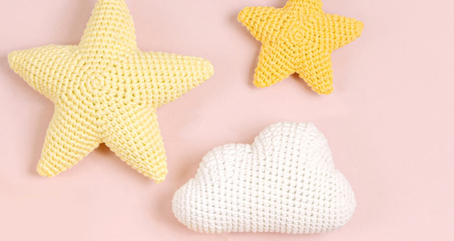 Dazzle Home with Knitted Star Cushions