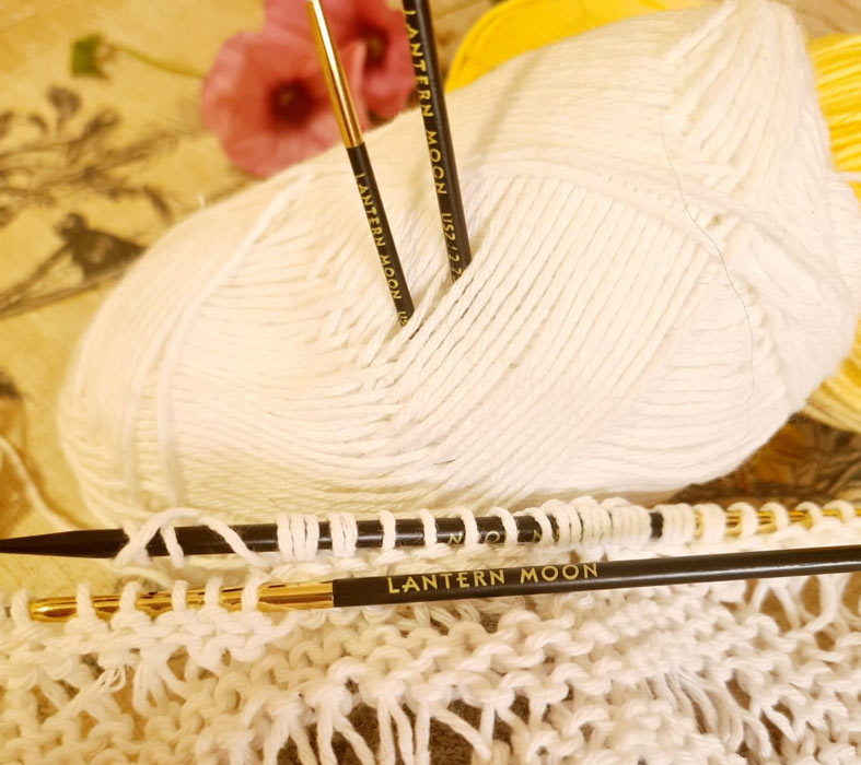 The Art of Knitting Lacework with Wooden Knitting Needles