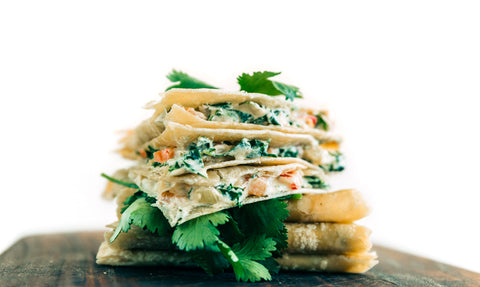 Stack of loaded kale quesadillas