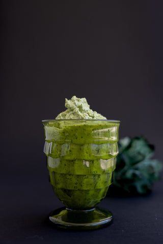 Creamy pesto in a glass seen from the side