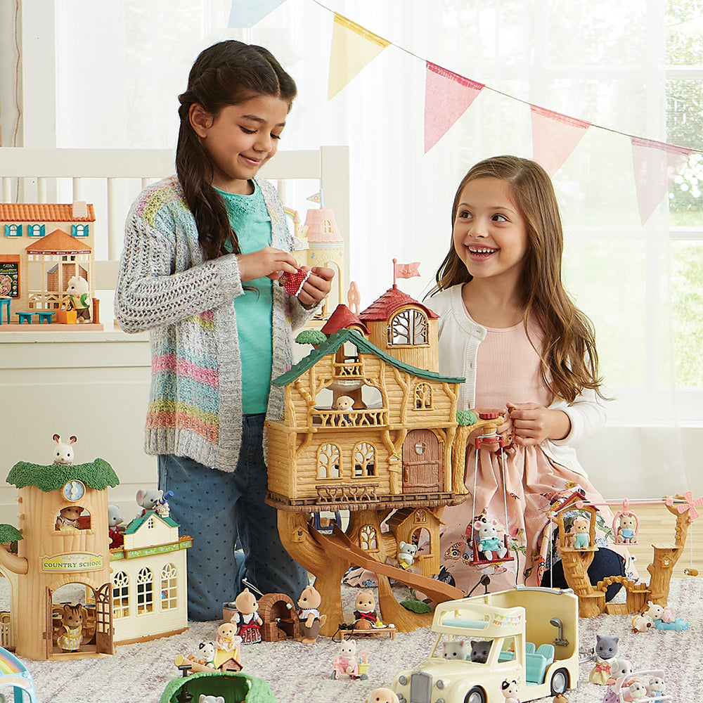 Girls playing with the Adventure Tree House Gift Set