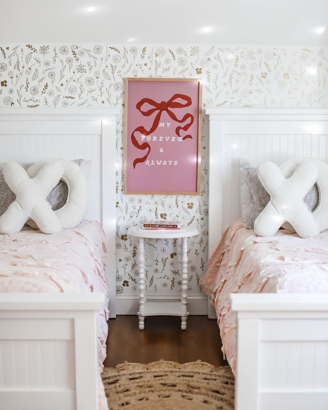 A sisters room with a framed print with the quote "My forever and always"