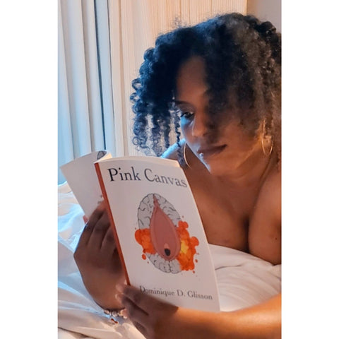 Woman reading Pink Canvas by Dominique D. Glisson