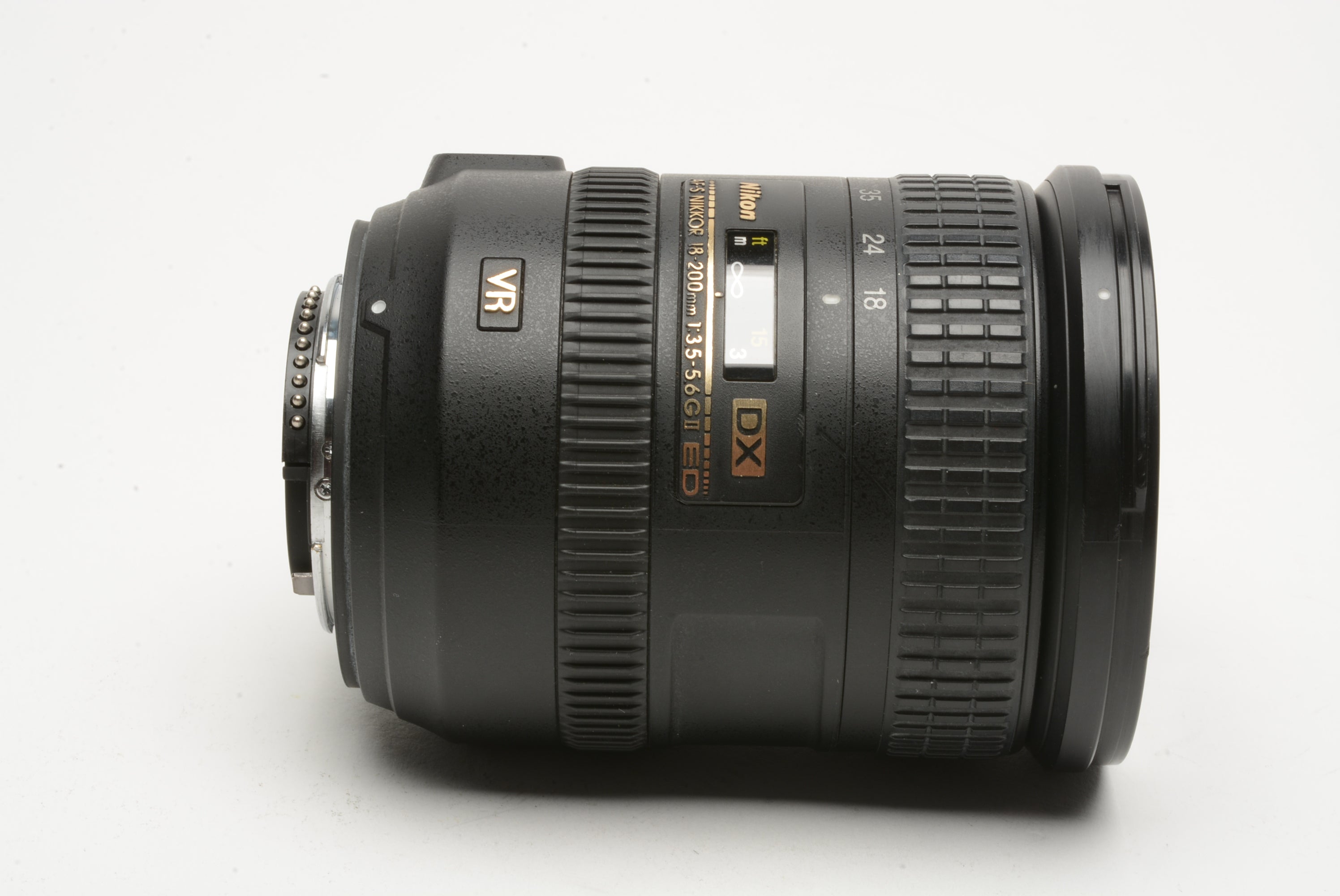 Nikon AF-S 18-200mm f3.5-5.6 GII ED VR DX zoom lens, caps