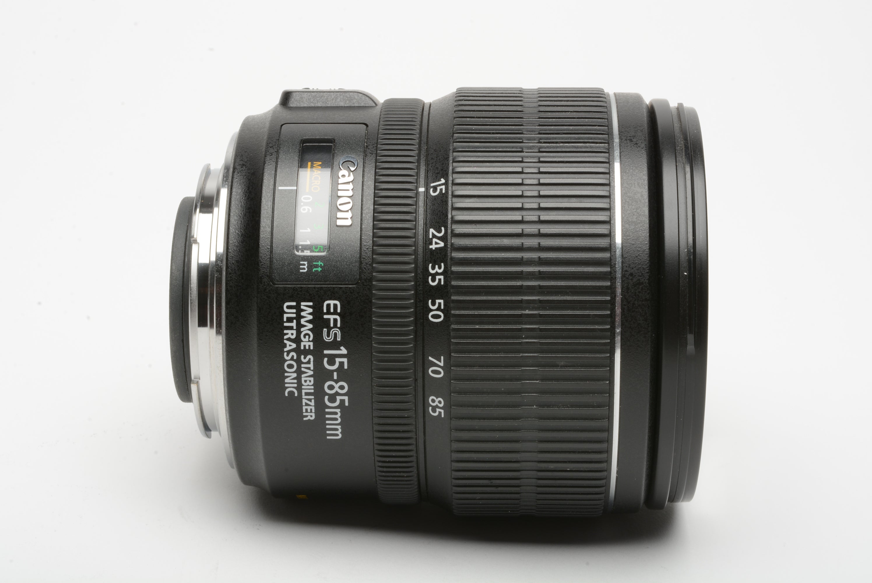 Canon EFS 15-85mm f3.5-5.6 IS USM zoom lens, hood+caps+UV