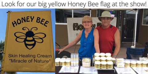 Picture of Honey Bee booth at Stuart FL with Big Yellow Honey Bee flag