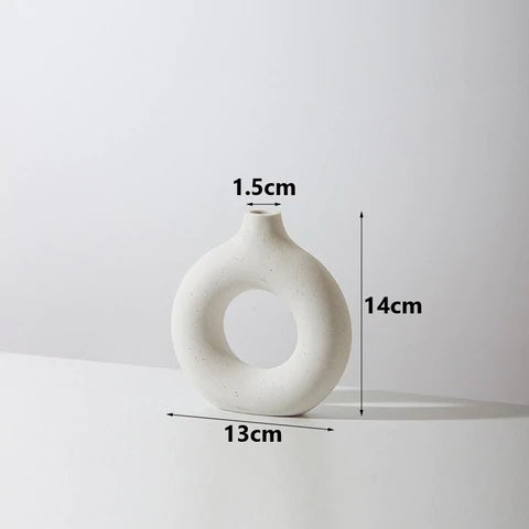 white circular vase