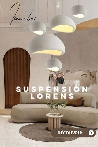 salon moderne dans les tons de beige éclairé par un ensemble de suspensions luminaires design 