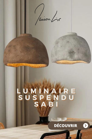 luminaire suspendu wabi sabi marron et gris au dessus d'une table à manger style contemporain