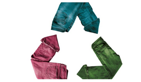 three pairs of jeans laid in a recycle shape