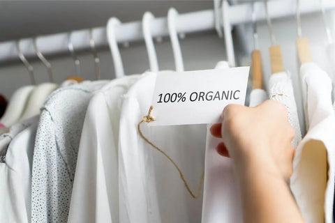 Holding organic clothing label