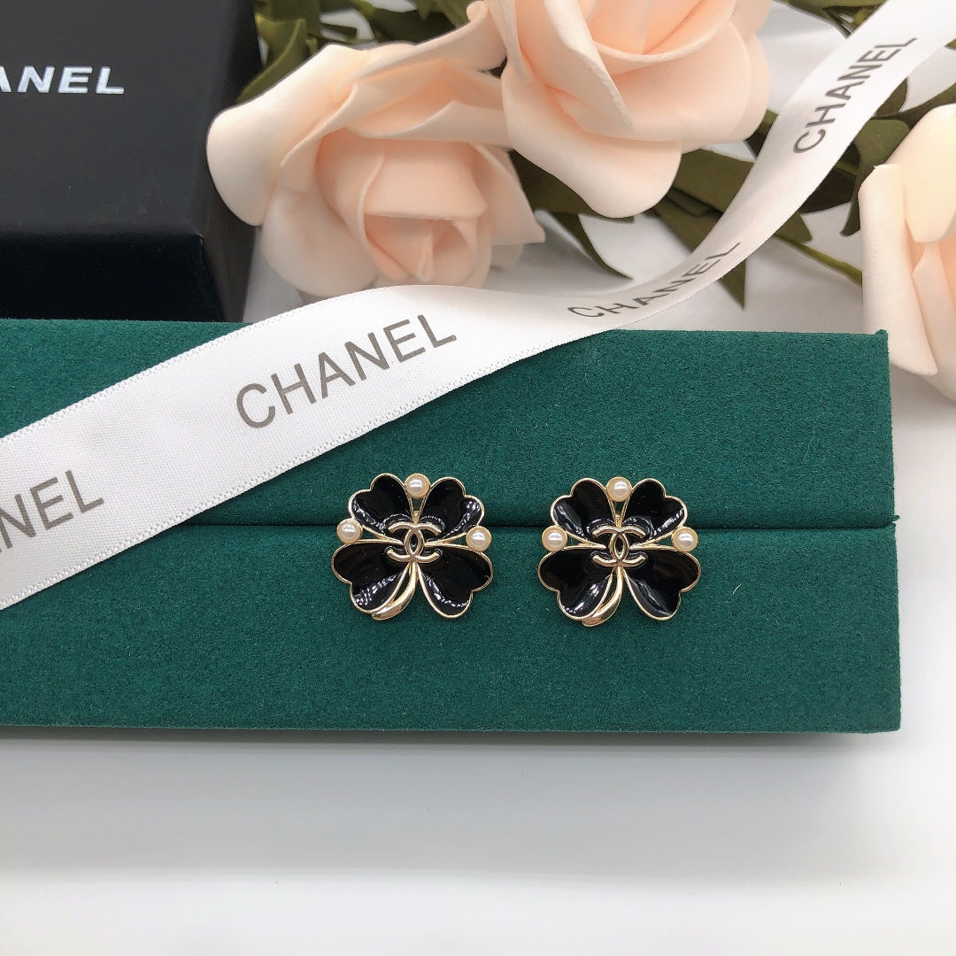 black clover earrings chanel