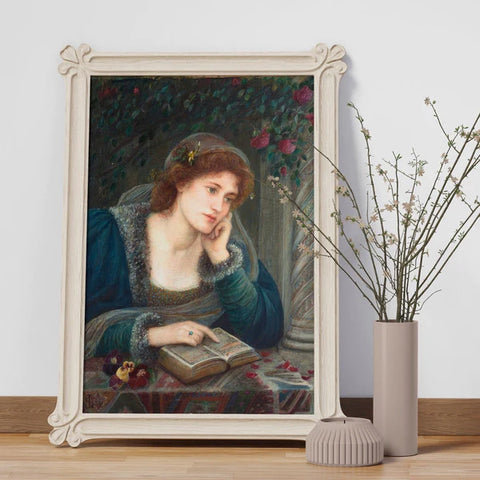 A classic Pre-Raphaelite painting by Marie Spartali Stillman titled 'Beatrice', showing a woman reading a book - challenging the idea of 'woman-as-object'.