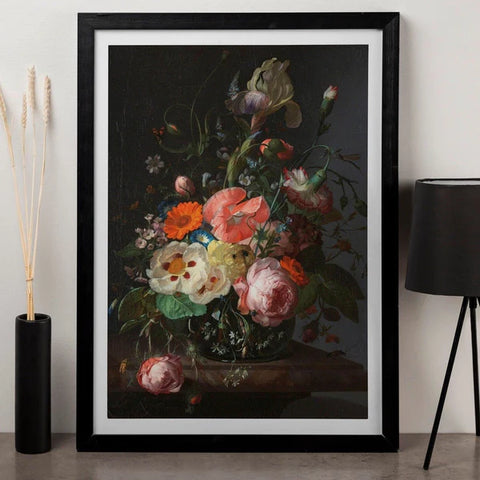 Rachel Ruysch framed artwork showing her flower painting 'Still Life  With Flowers On A Marble Tabletop'. Dark background, with beautiful realistic flowers painted with a single light source.