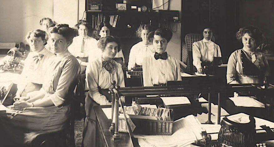 Black and white photograph of a group of working women in the late 19th Century