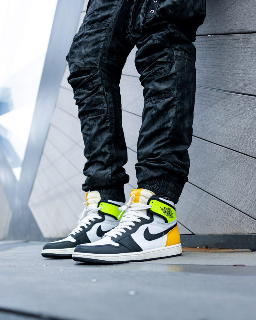 jordan 1 white black volt university gold