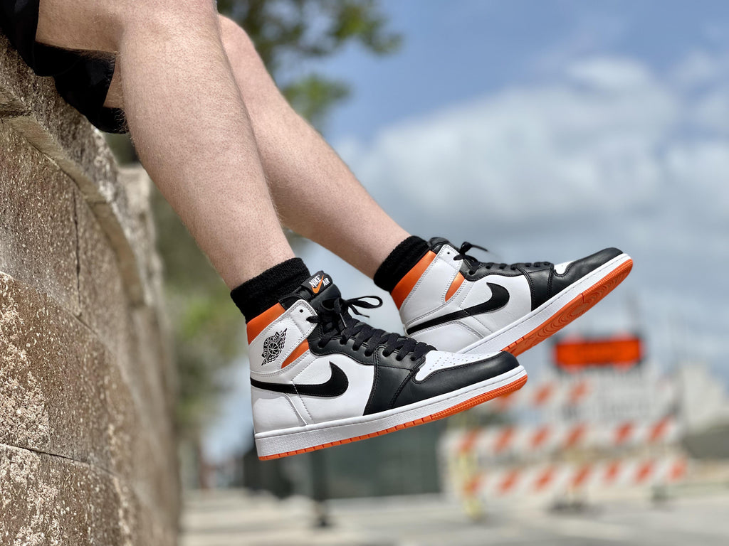 electro orange jordan 1 on foot